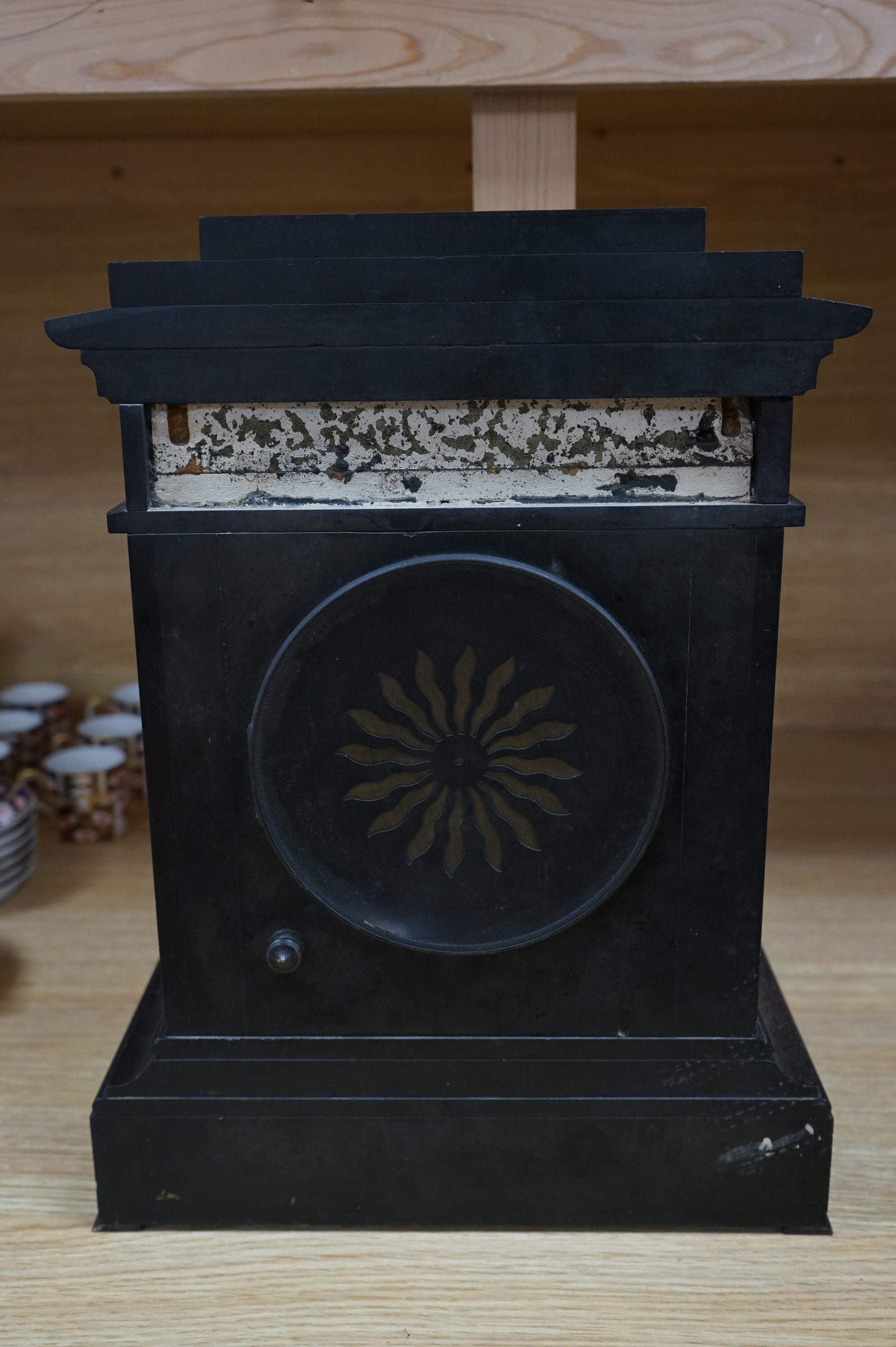 A Victorian slate clock, with copper embossed figural panel, 37cm high. Condition - unknown if working, case good